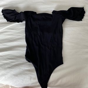 Black ribbed ruffle off the shoulder Wilfred body suit